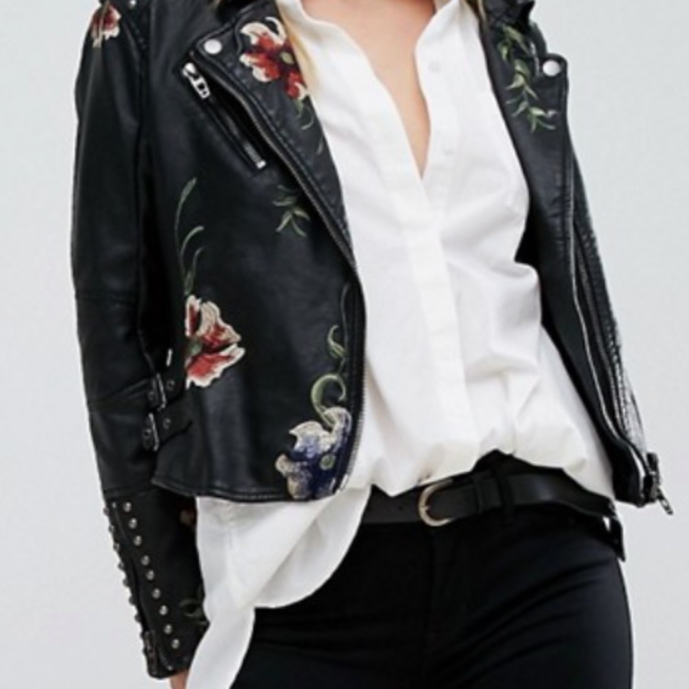 Studded, embroidered moto jacket.